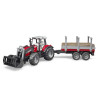 Massey Ferguson 7480 avec chargeur frontal et remorque à bois